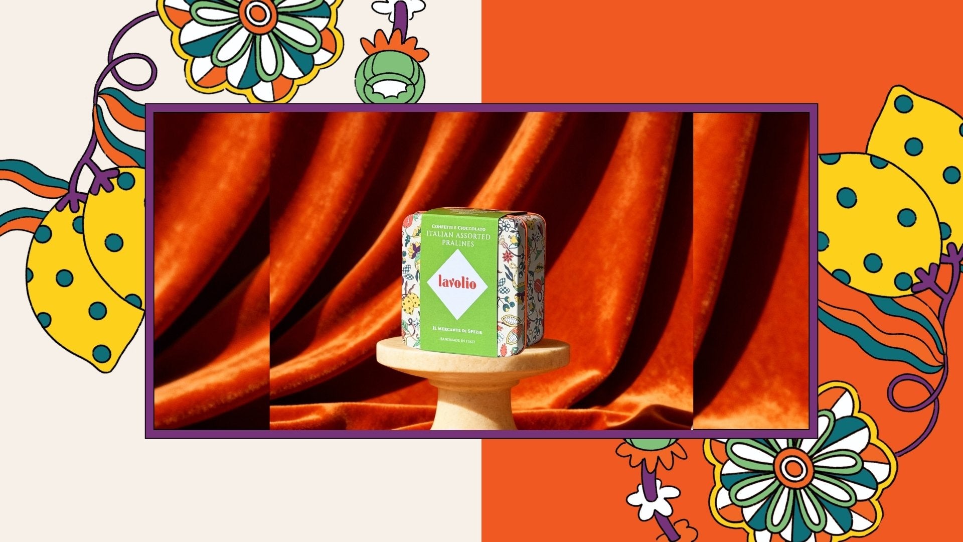 Lavolio tin box on a stand with colorful floral decorations and an orange background